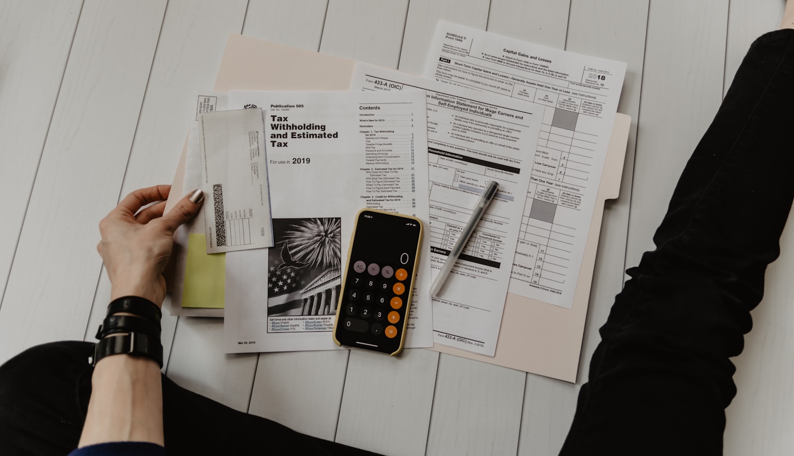Paperwork spread across a district office desk
